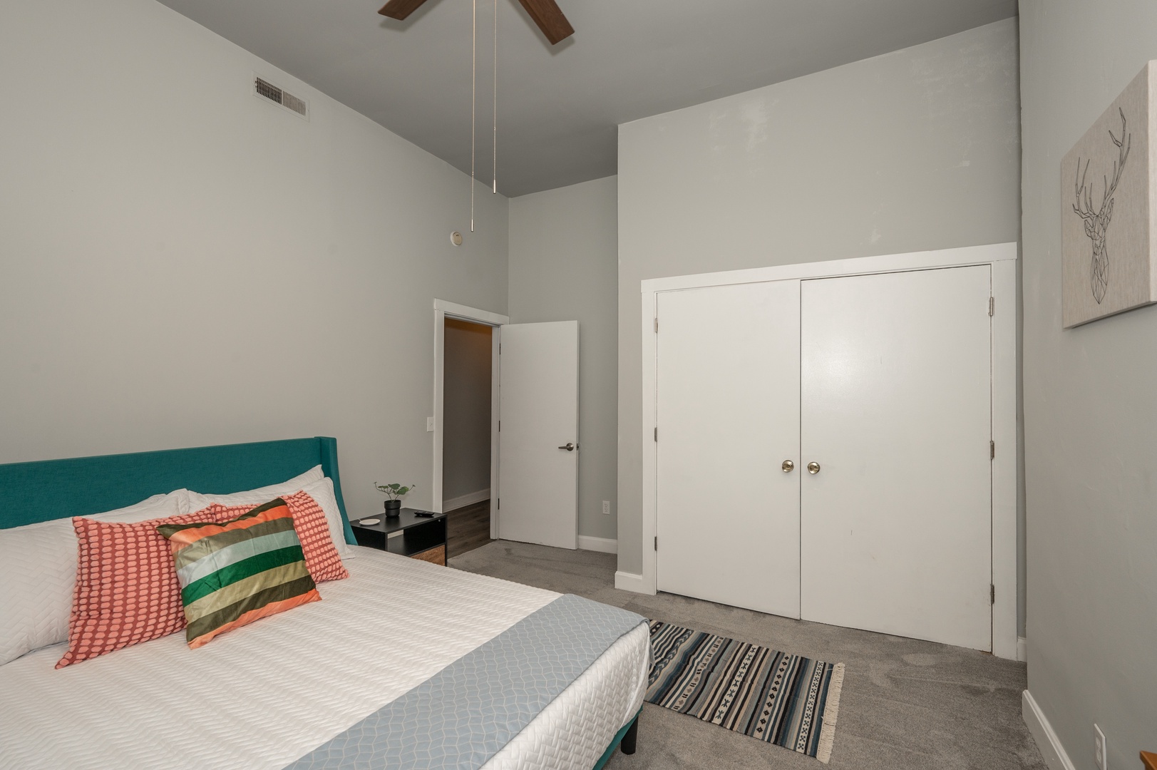 Unit 2: The 2nd of 2 queen bedrooms offers a Smart TV & ceiling fan