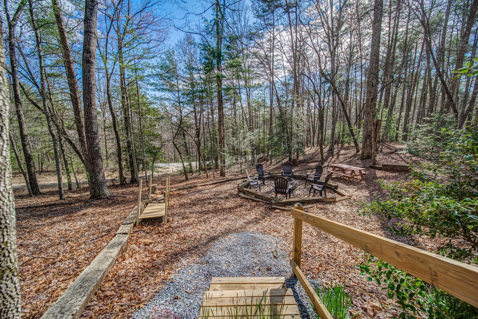 Escape from it all down a wooded pathway to the Firepit area
