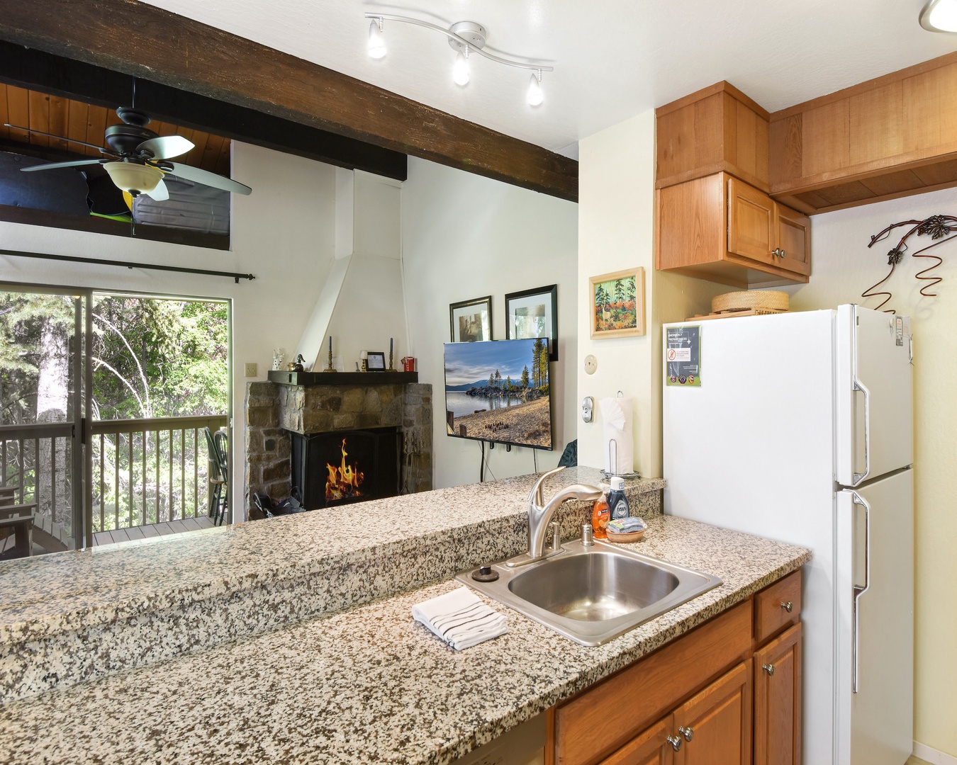 Kitchen with drip coffee pot, toaster, toaster oven, and more
