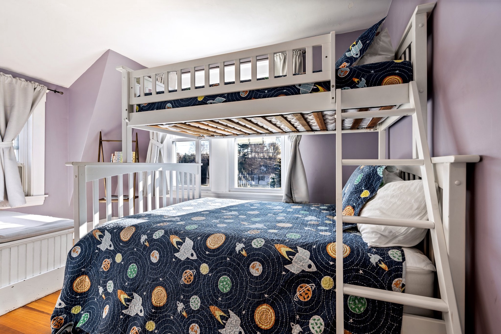 This bedroom retreat offers twin over full bunkbed