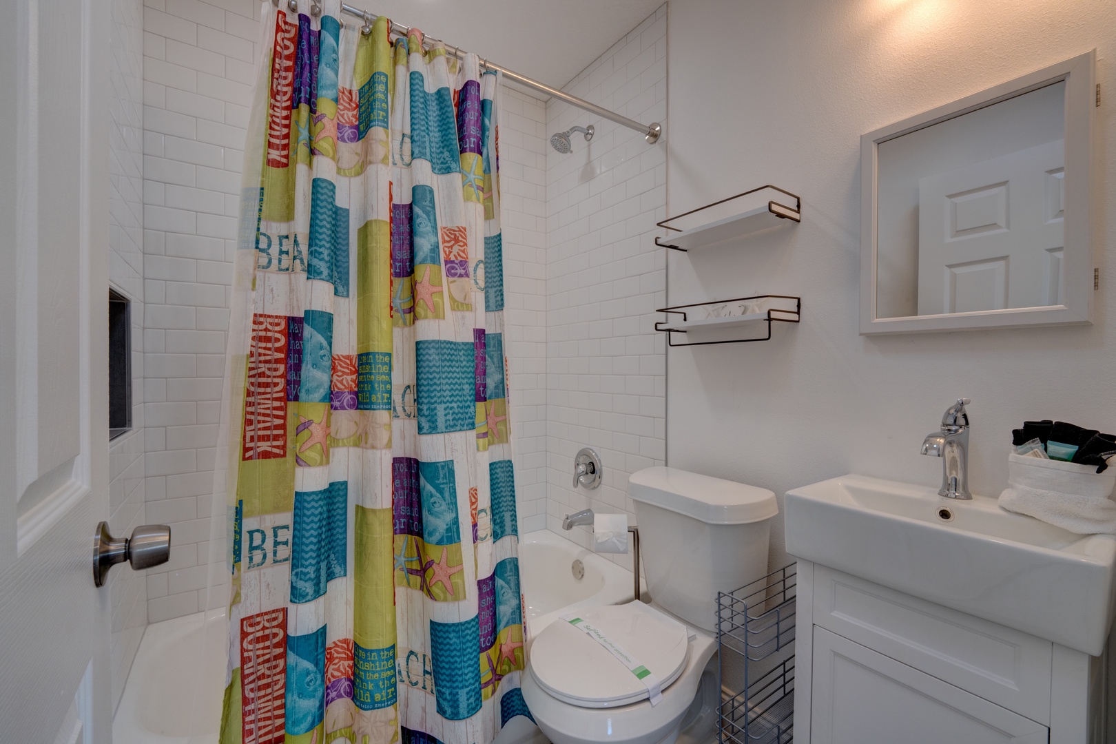 Wash up with this full bath’s single vanity & shower/tub combo