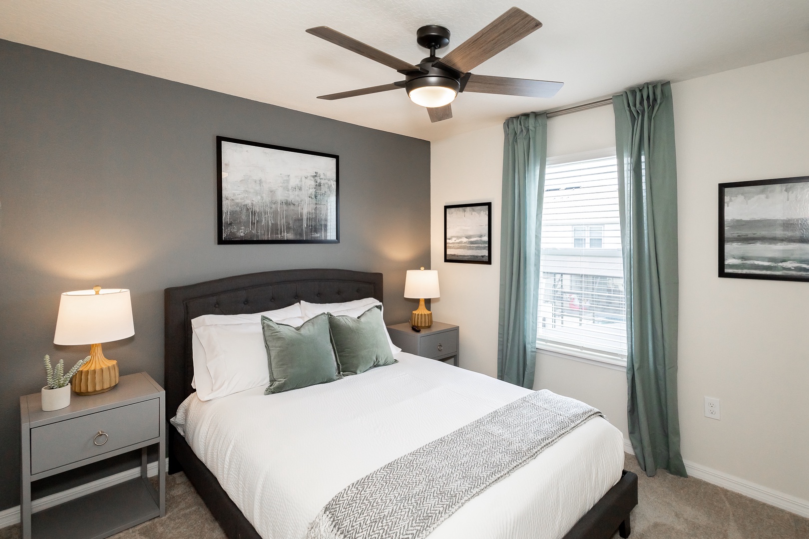 Bedroom 5 offers a queen bed, Smart TV, & private en suite