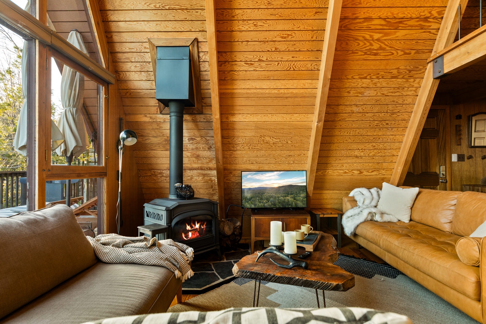 Curl up next to the electric fireplace, no firewood required in the living room & stream all your favorite entertainment