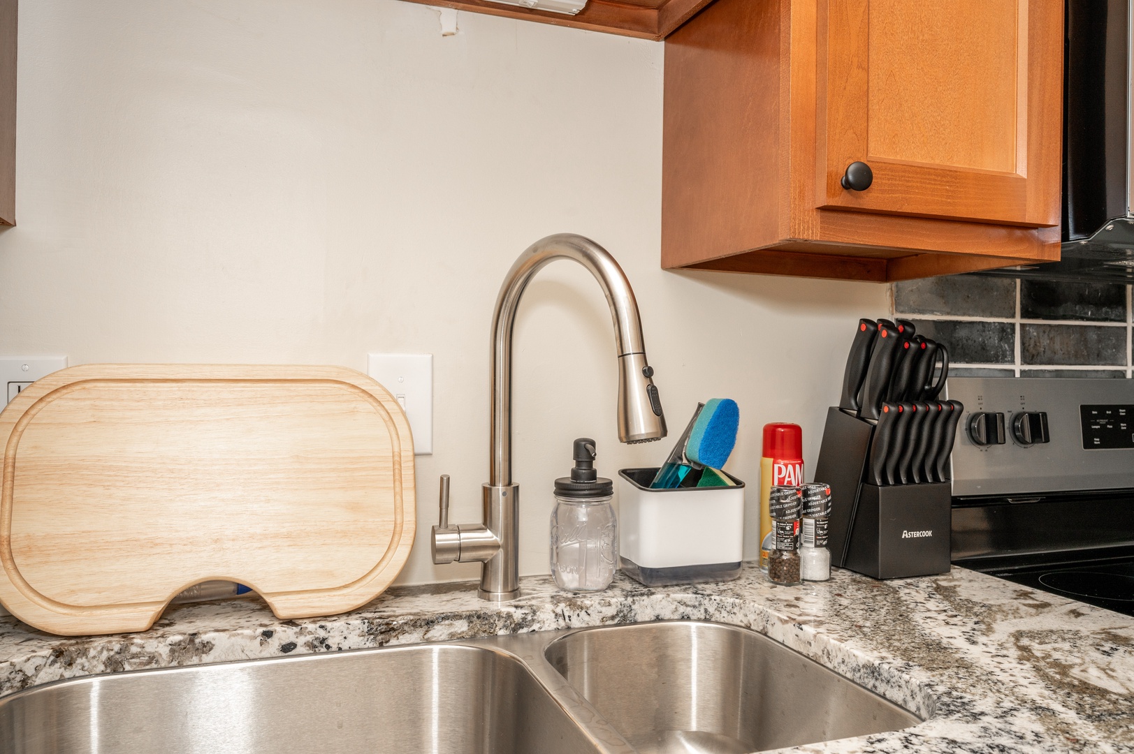 The open, airy kitchen offers ample space & all the comforts of home