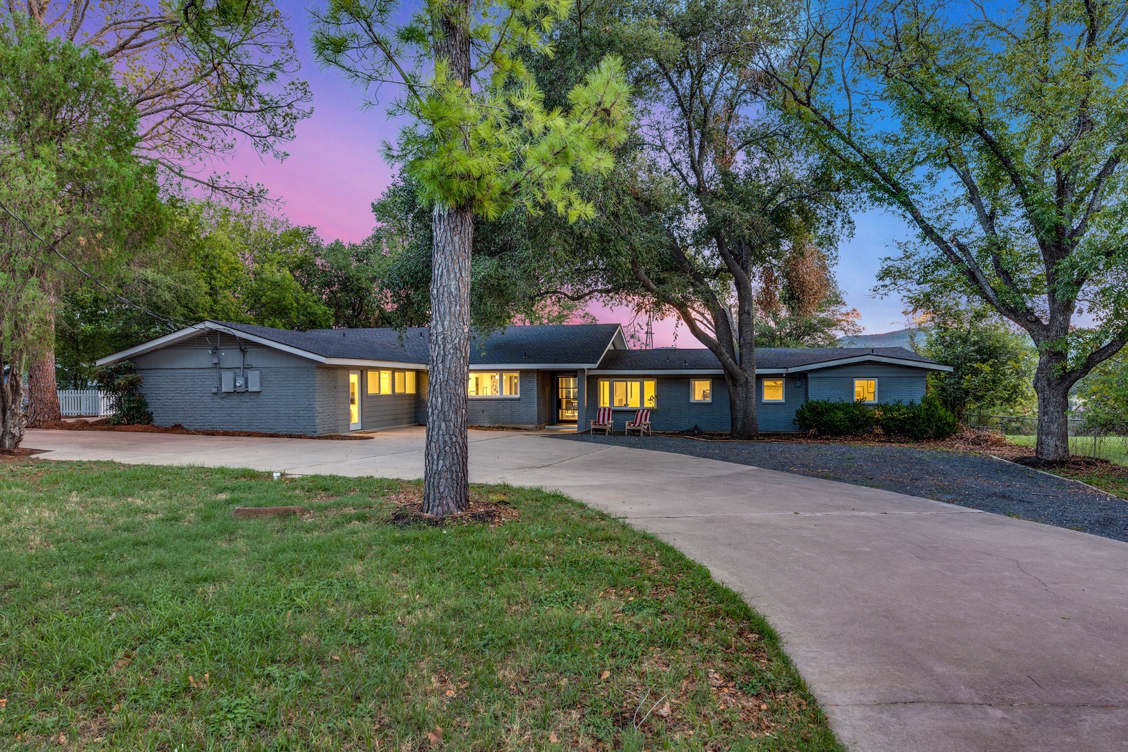 This spacious lakeside home offers driveway parking for 8 vehicles