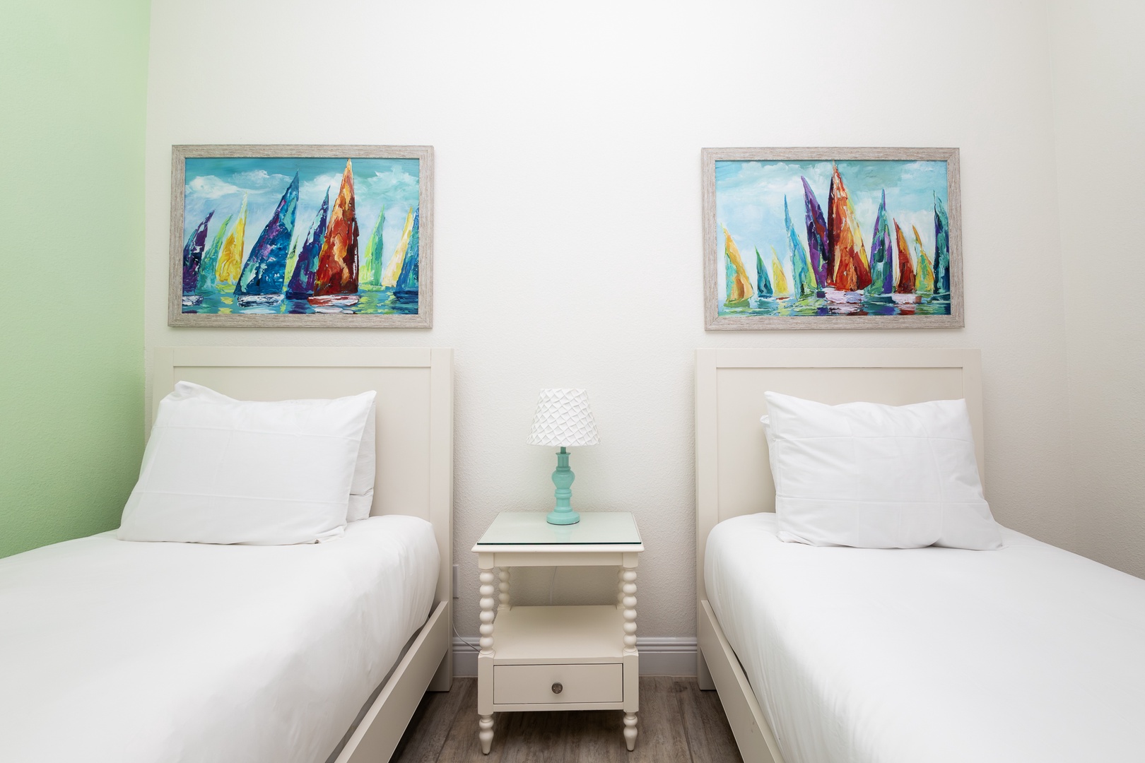This 2nd floor bedroom suite offers two plush twin beds ensuite & smart TV