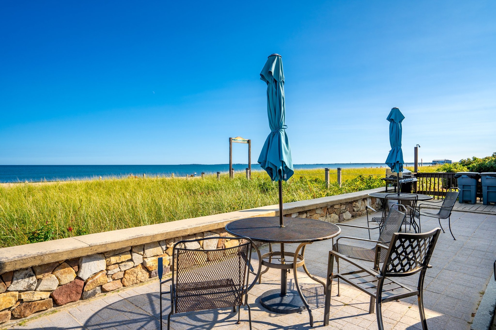 Sip morning coffee or dine alfresco on the shared seaside patio