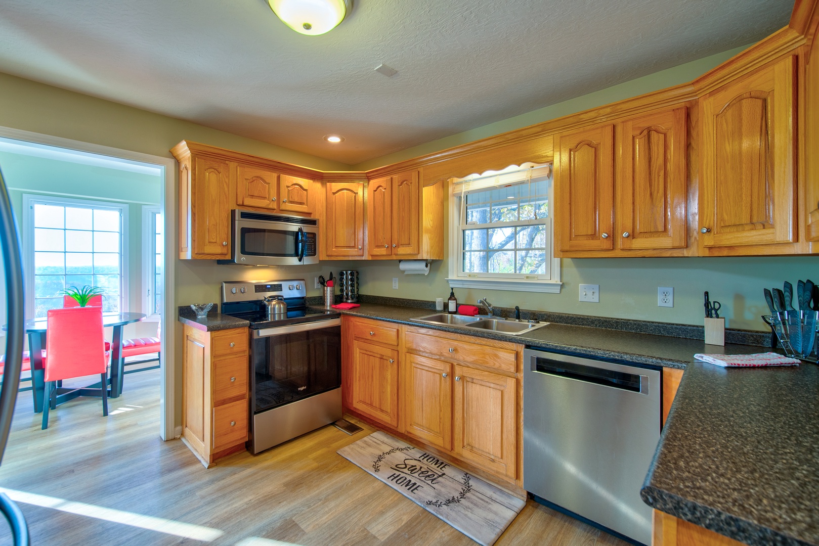 The kitchen is spacious & offers all the comforts of home