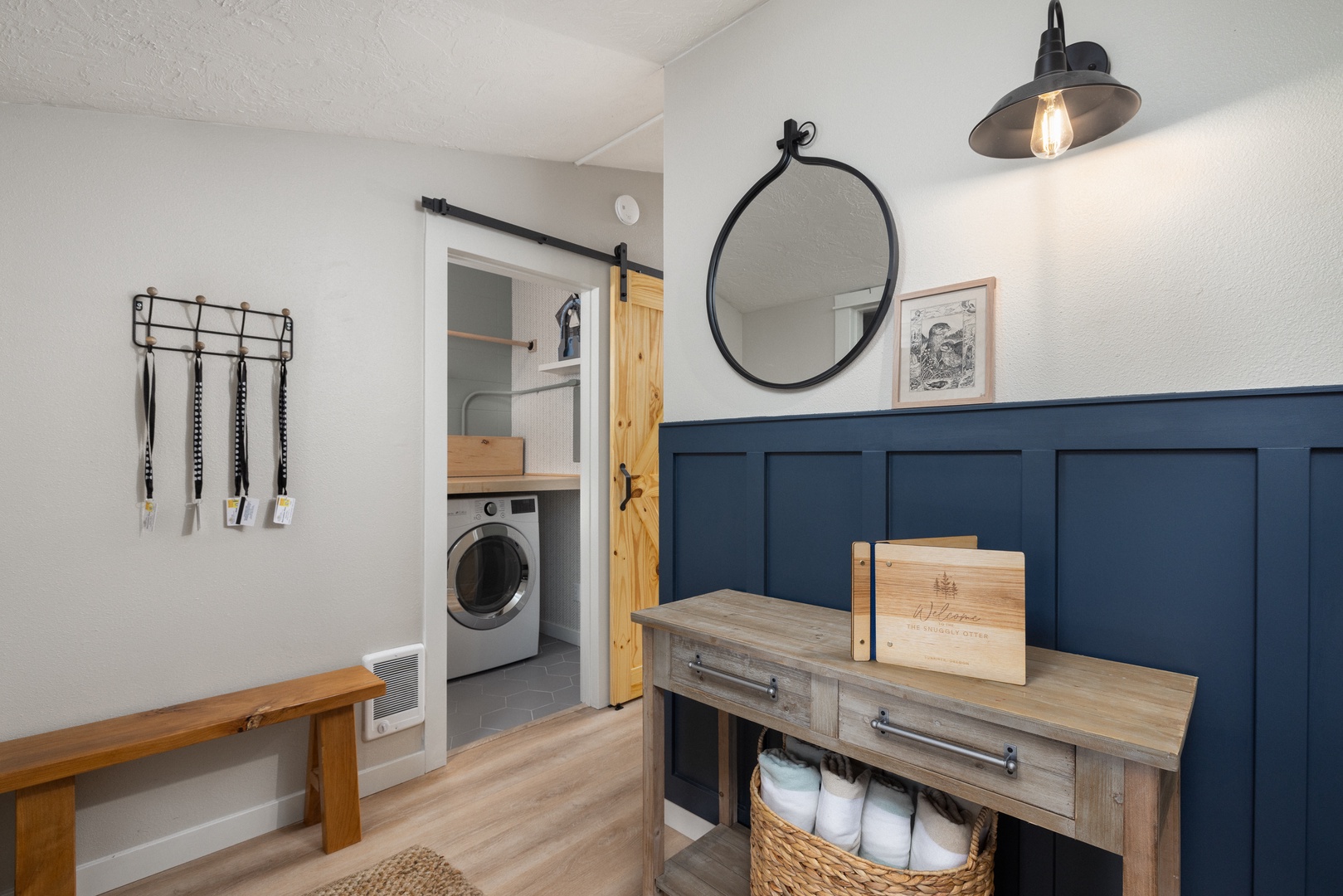 Private laundry is available for your stay, tucked away near the entrance