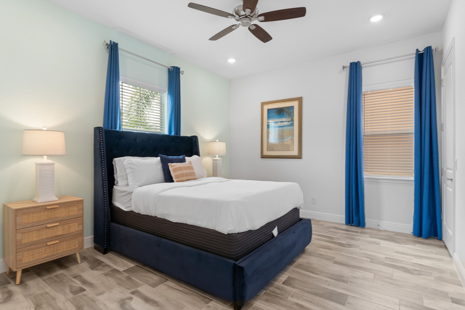 Coastal elegance awaits in this main-level queen bedroom, with ensuite bath