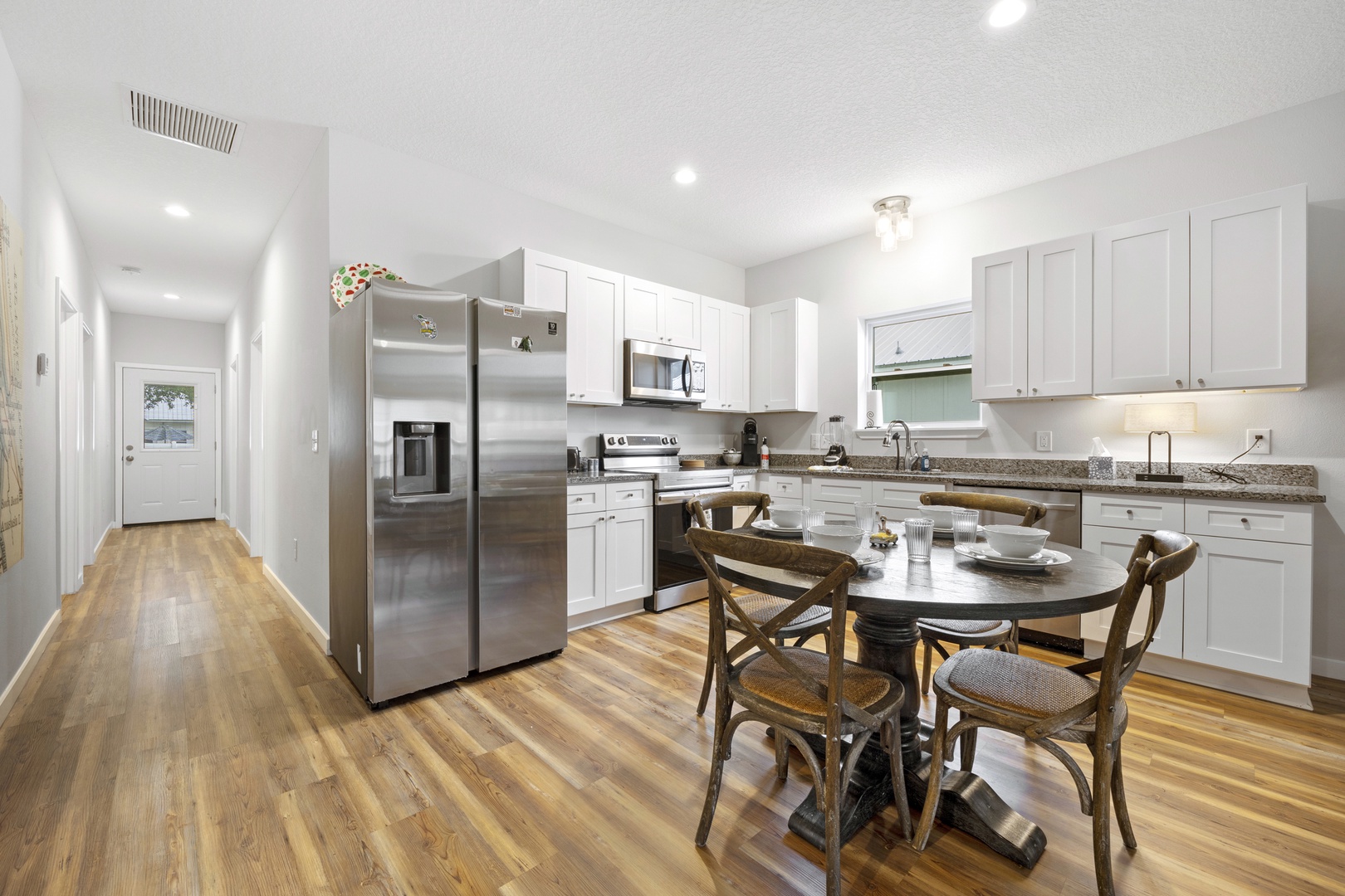 The updated kitchen offers ample space & all the comforts of home