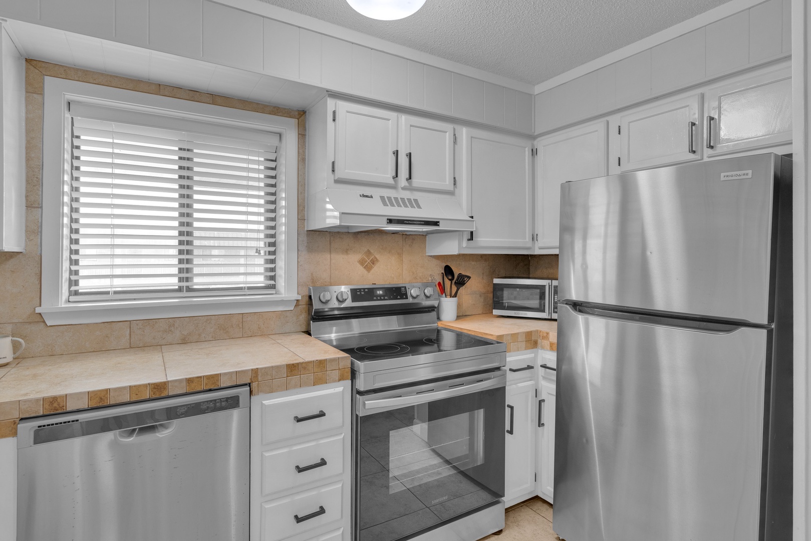 Bright fully equipped kitchen to craft culinary delights