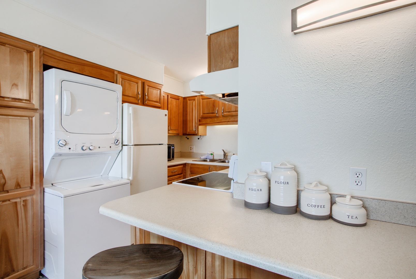 Private Laundry is available for your stay, conveniently tucked into the kitchen