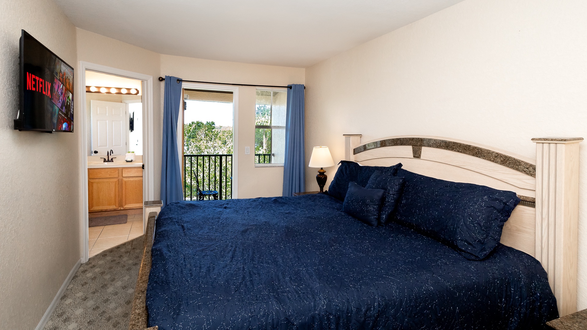 The 2nd floor king suite boasts a private en suite, Smart TV, & balcony access