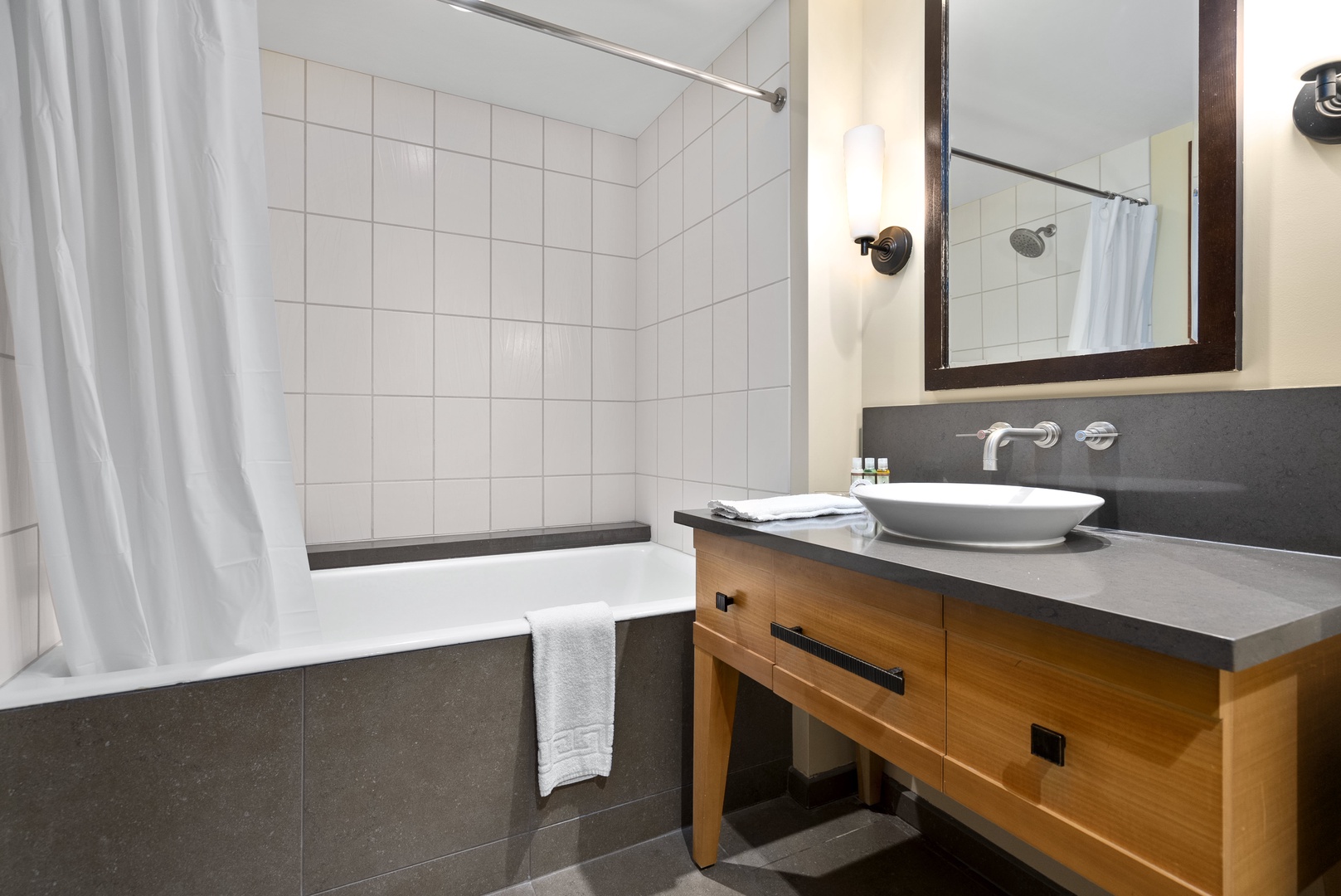 Bathroom 2 features a shower/tub combo