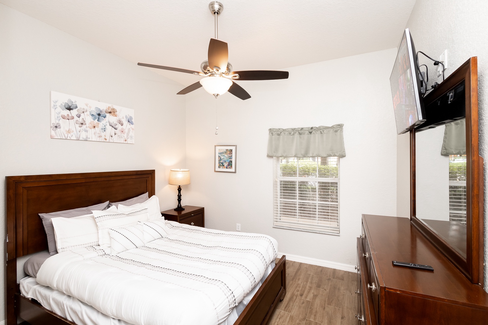 Bedroom 1 with queen bed and Smart TV