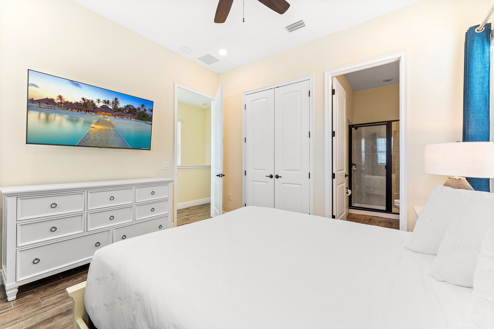 The second king suite showcases a Smart TV, private ensuite & patio access