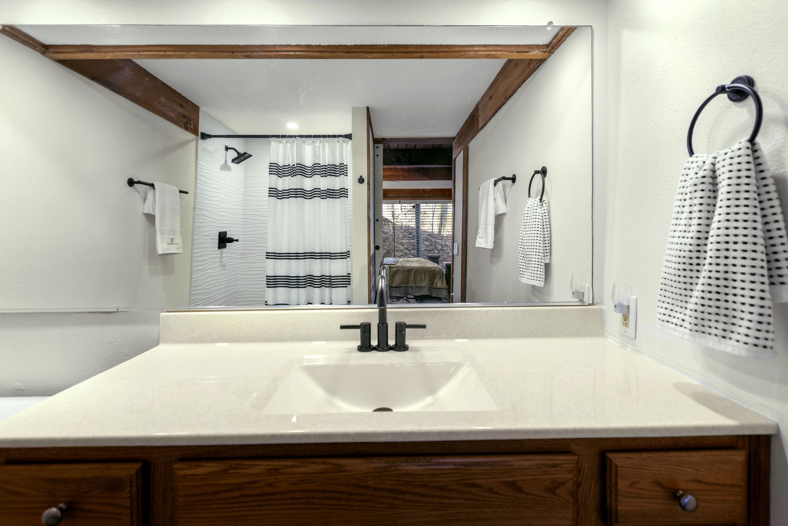 This ensuite bath features a large single vanity & walk-in shower