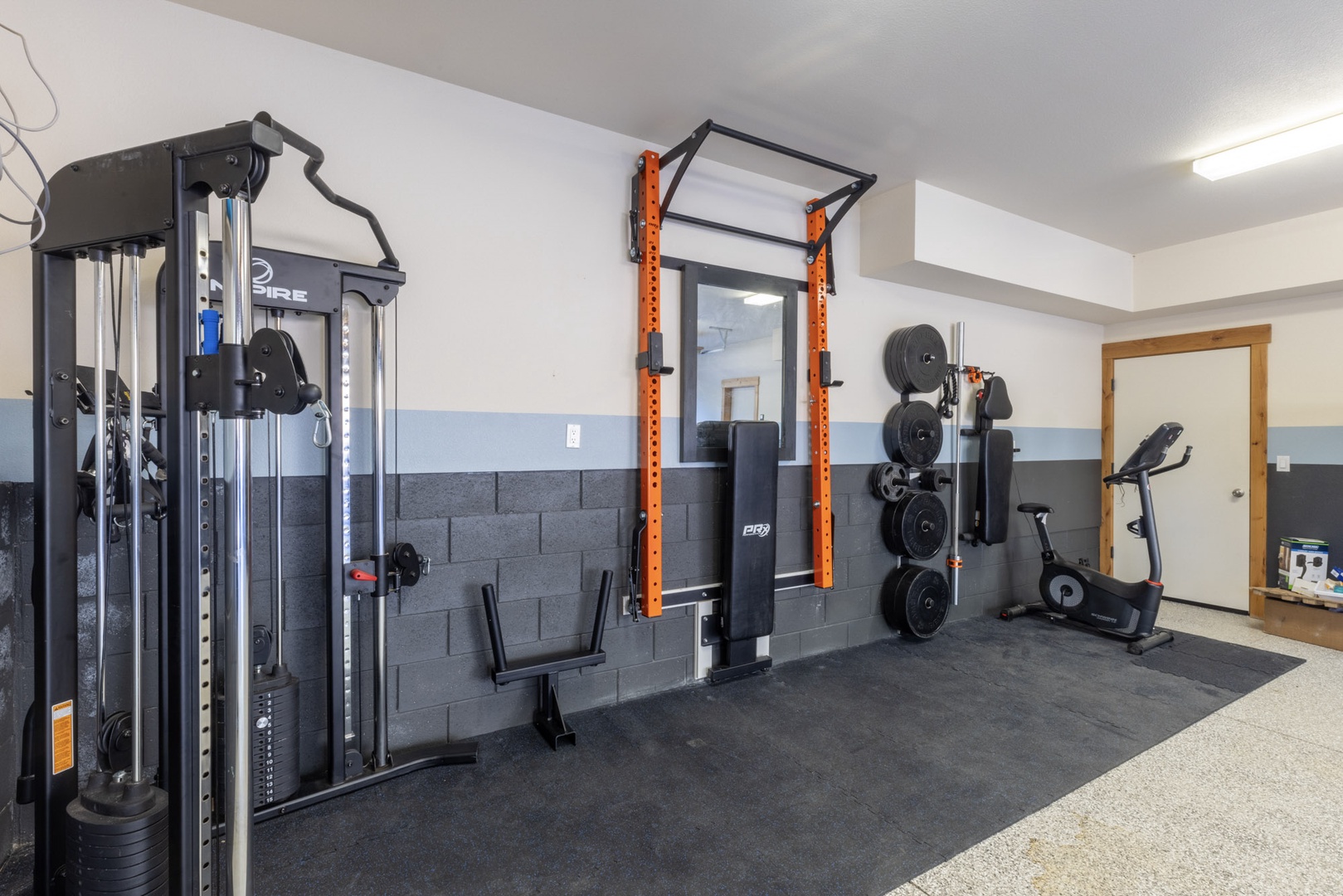 Keep up your excercise routine with the in-home fitness area!