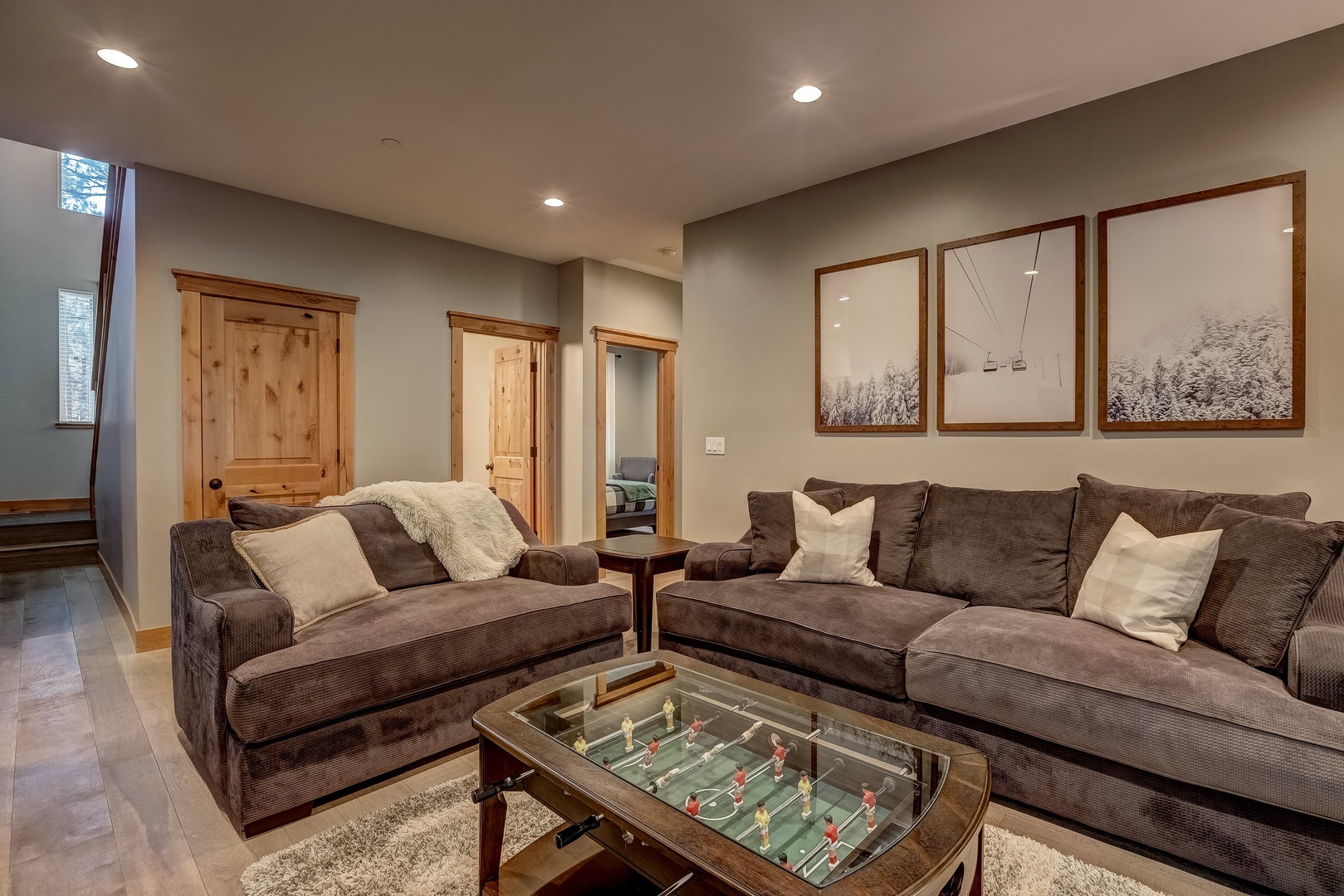 Family room with foosball table and arcade game