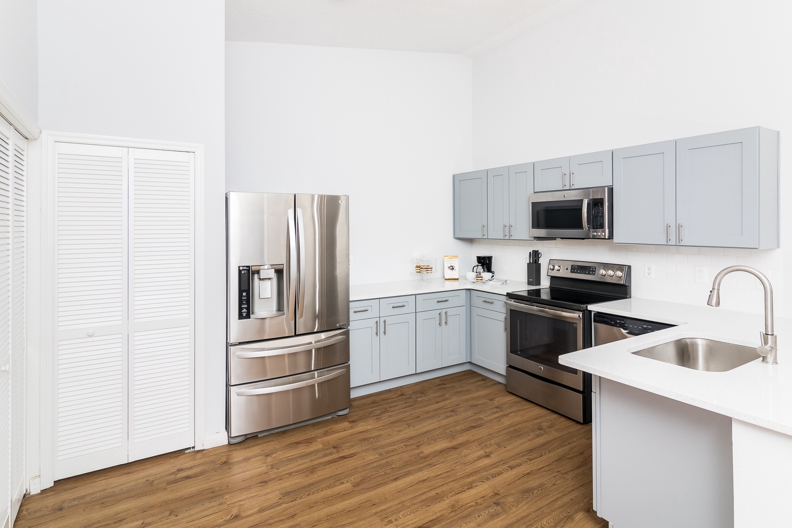 The kitchen offers ample storage space & all the comforts of home