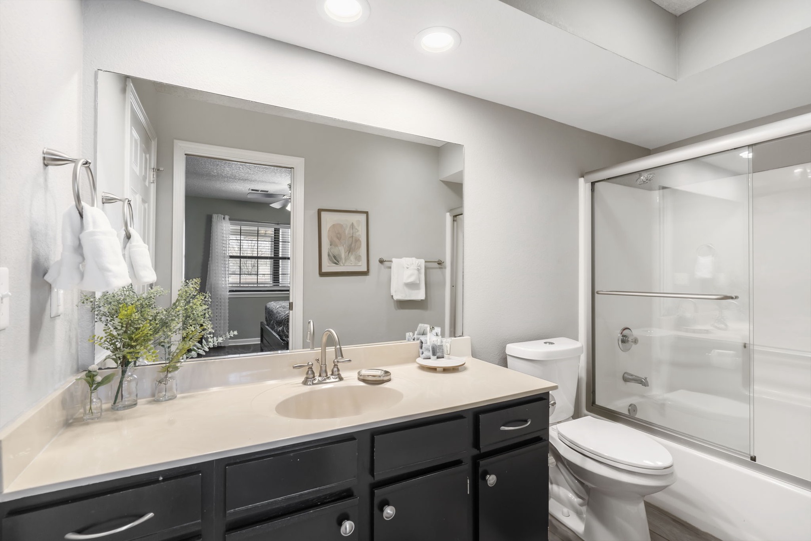 Unit 19: The 2nd ensuite includes a single vanity & shower/tub combo