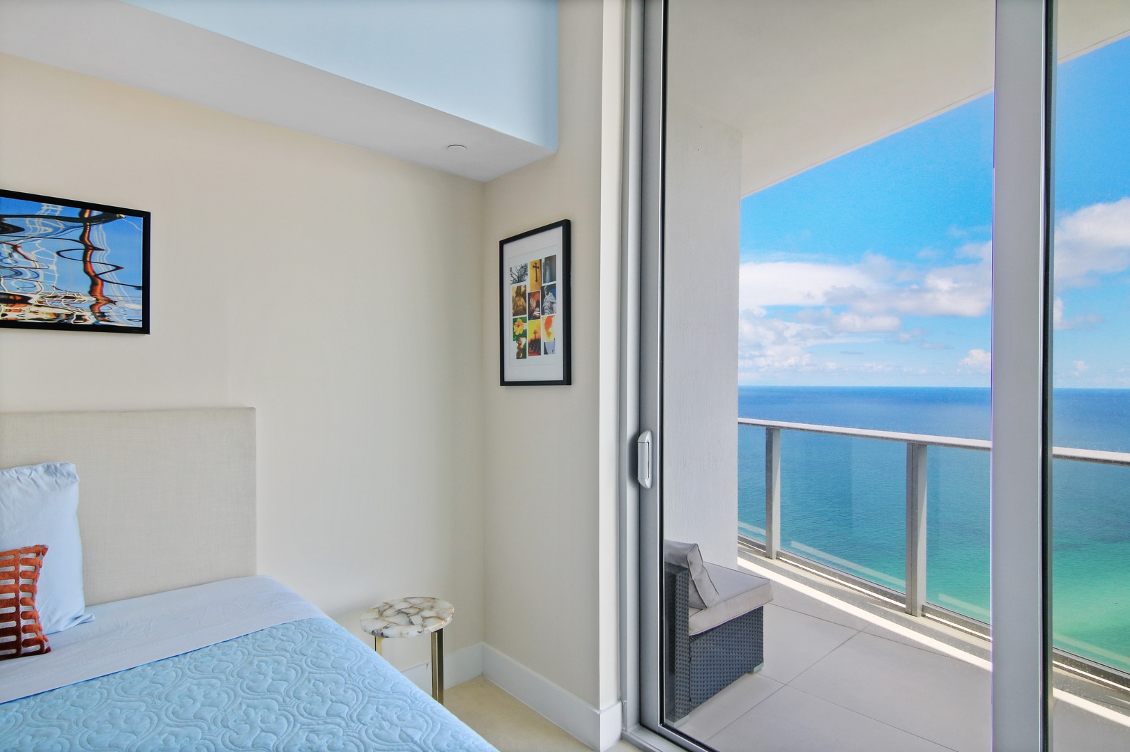 The 2nd of 2 double queen bedrooms offers a Smart TV, desk, & balcony access