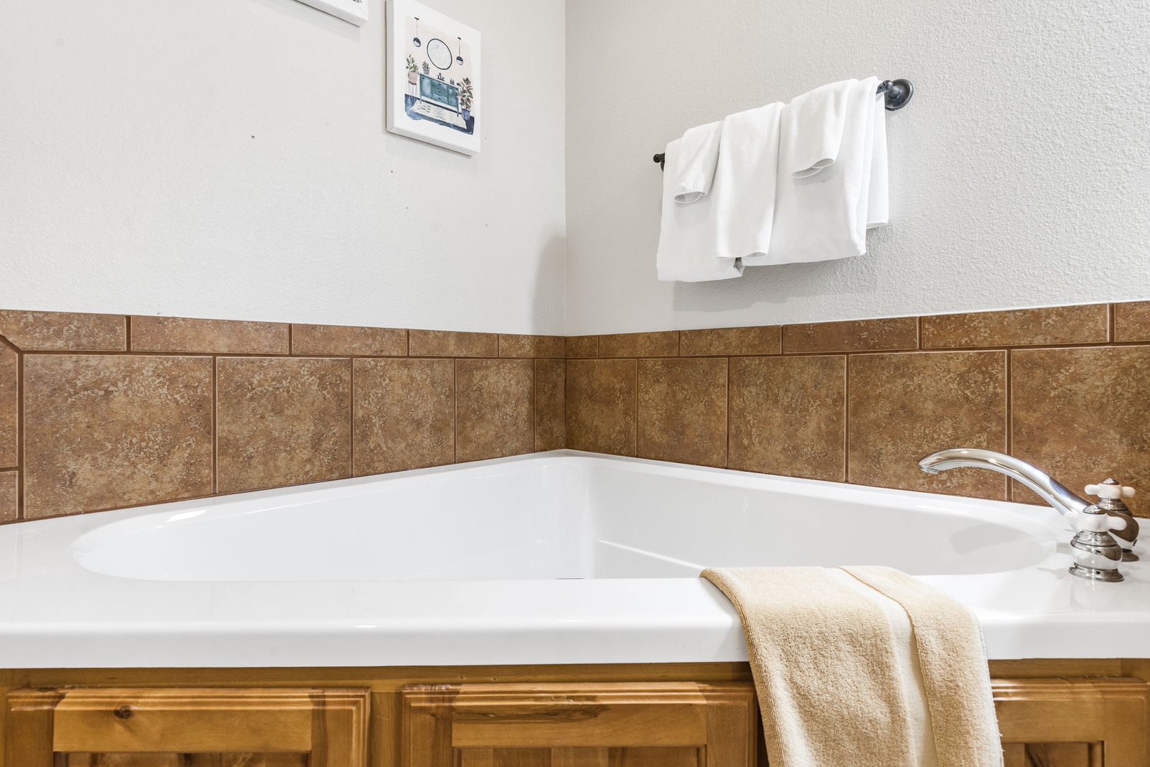 After a day spent exploring the area, spend time soaking in your luxurious corner tub