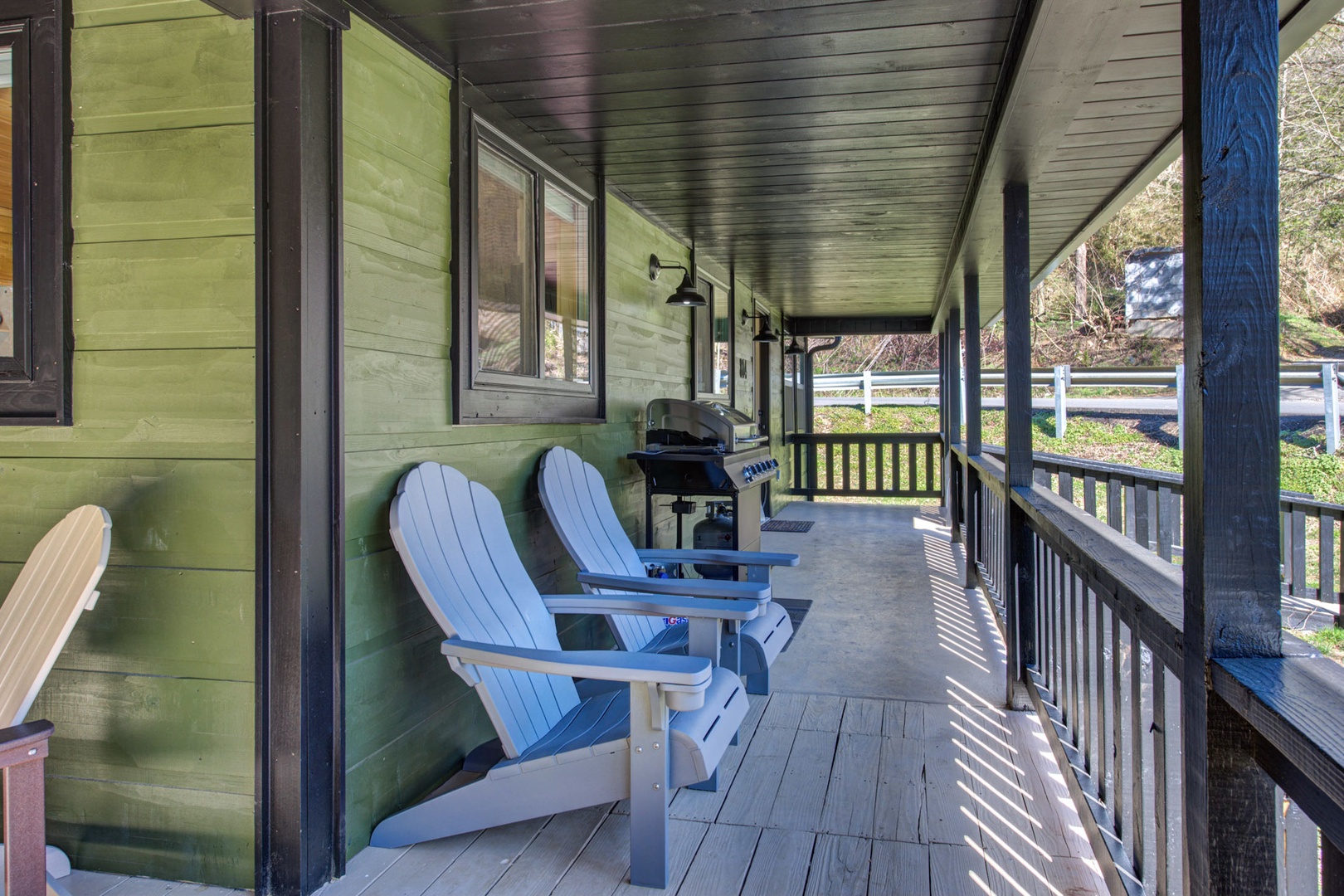 Our charming deck awaits you for leisurely afternoons in Adirondack chairs