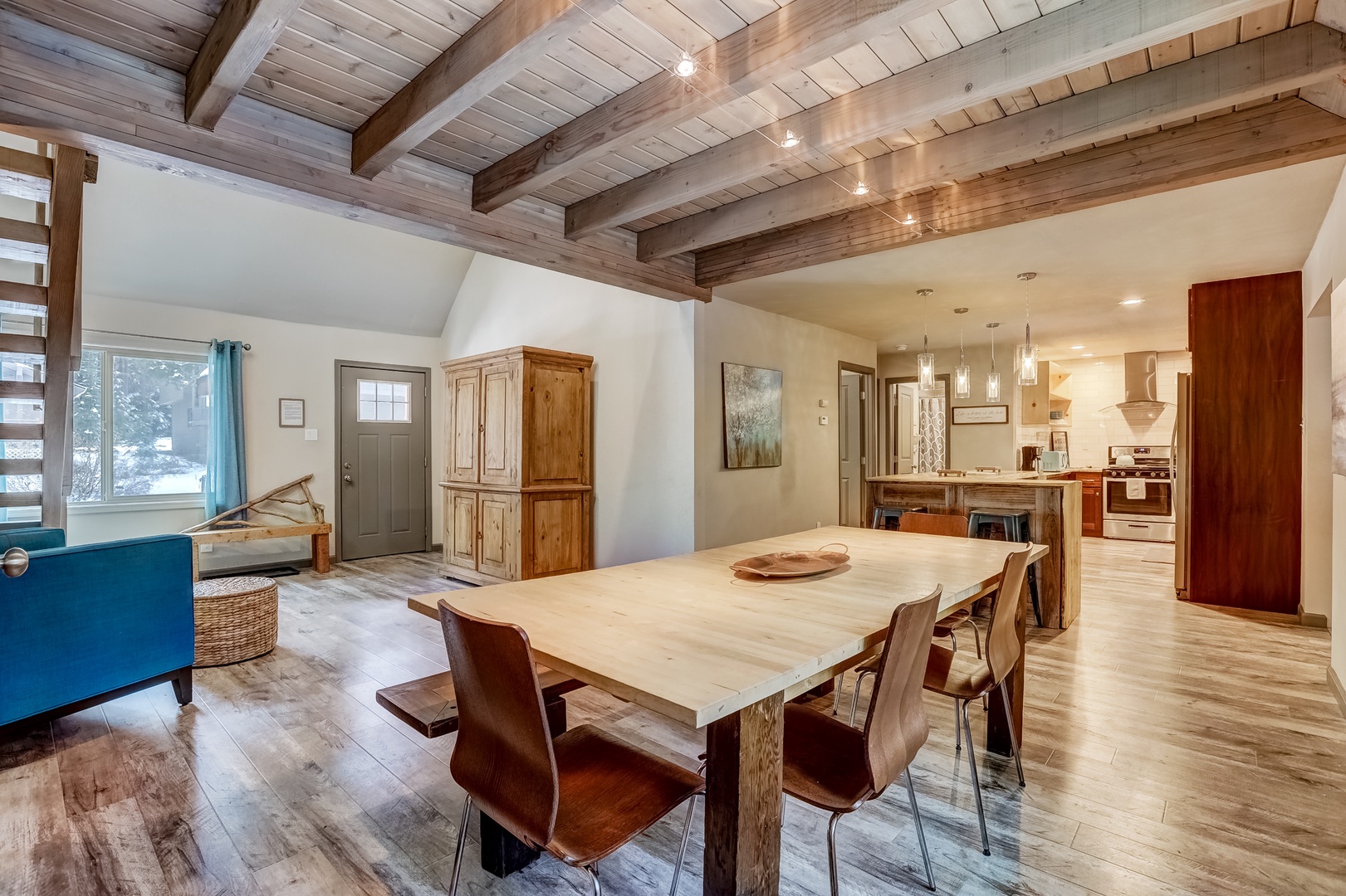 Enjoy the breezy open flow between the sitting room and kitchen/dining area