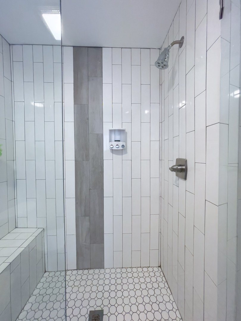 En suite bathroom standing shower