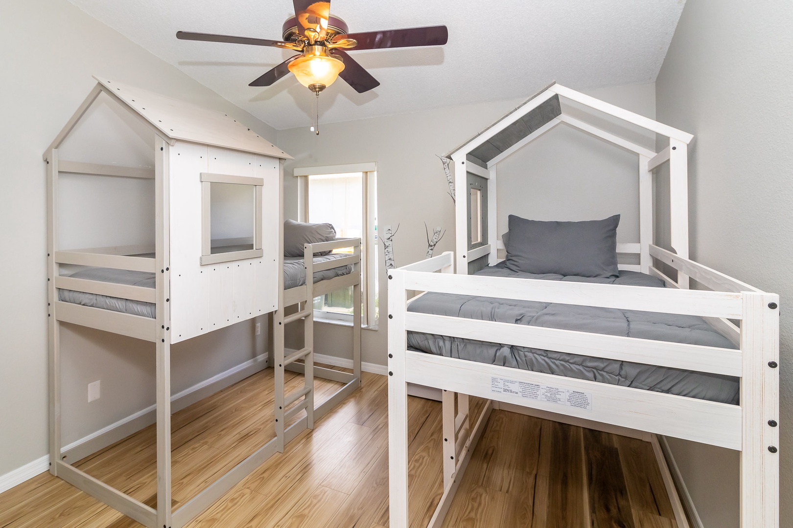 Kids FUN Bedroom #1 with 2 Twin beds. Additional mattresses can be added to the bottom bunk spaces