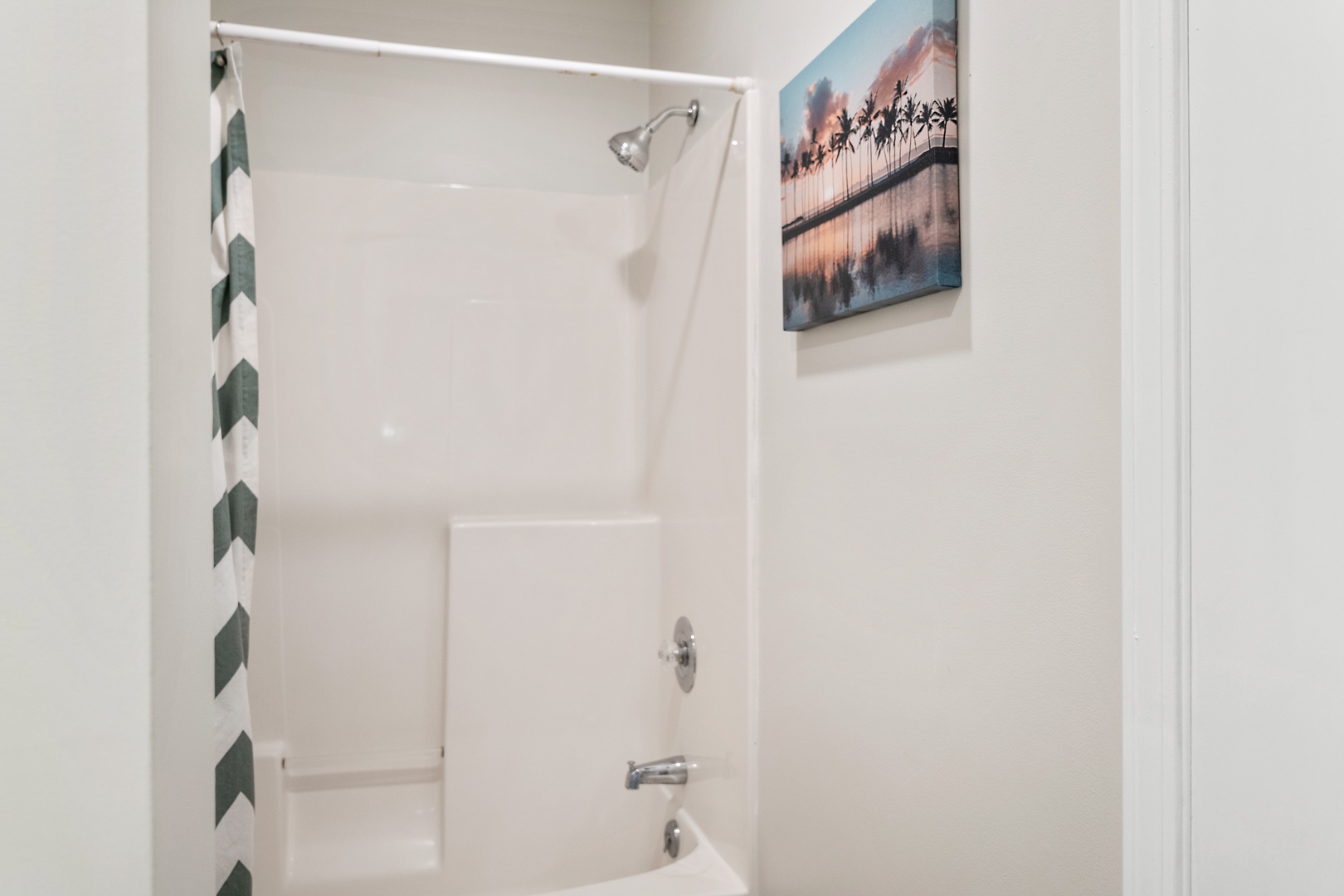 Wash up in the final full bath, featuring a single vanity & shower/tub combo