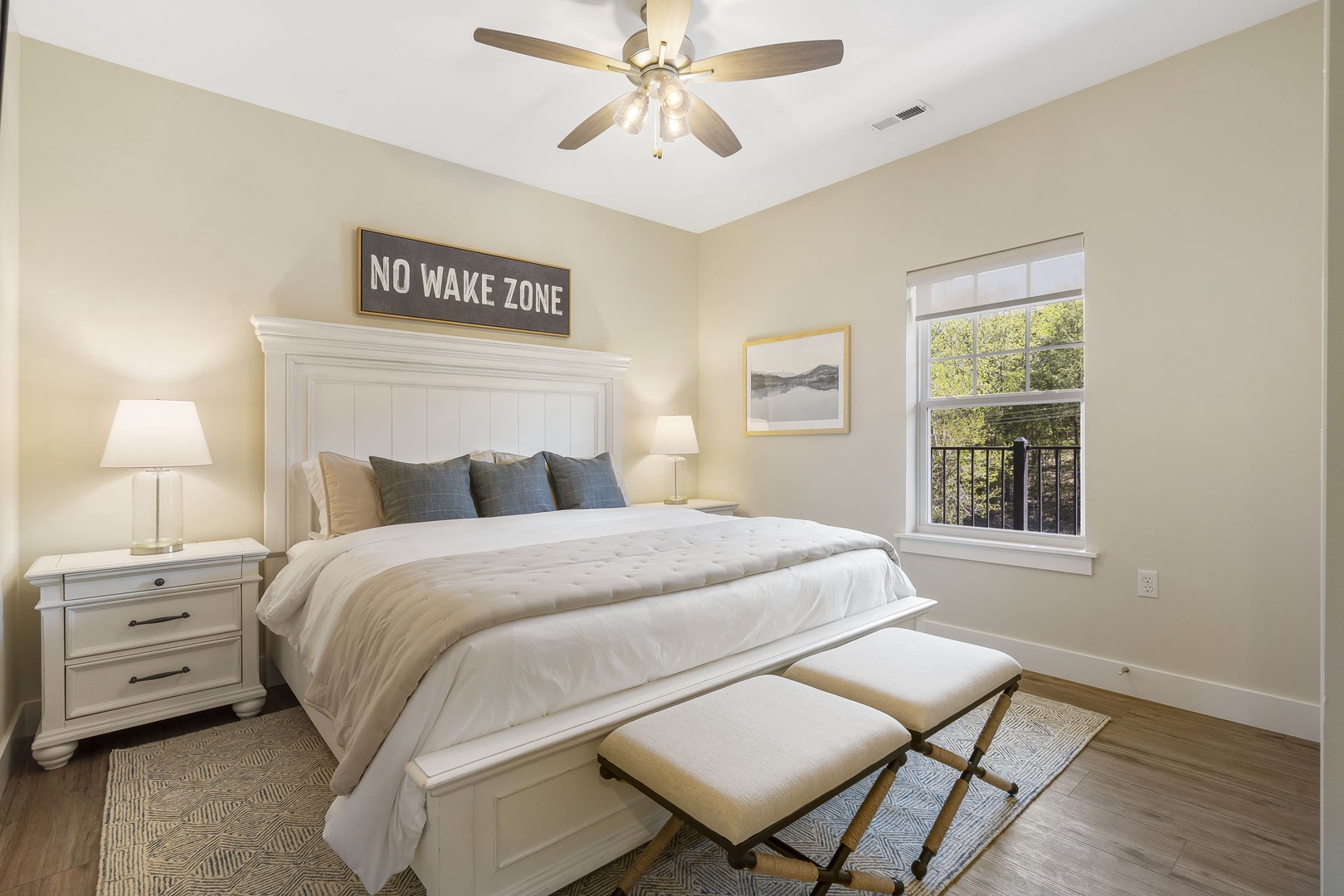 Escape to the additional King Bedroom with TV and Ceiling Fan