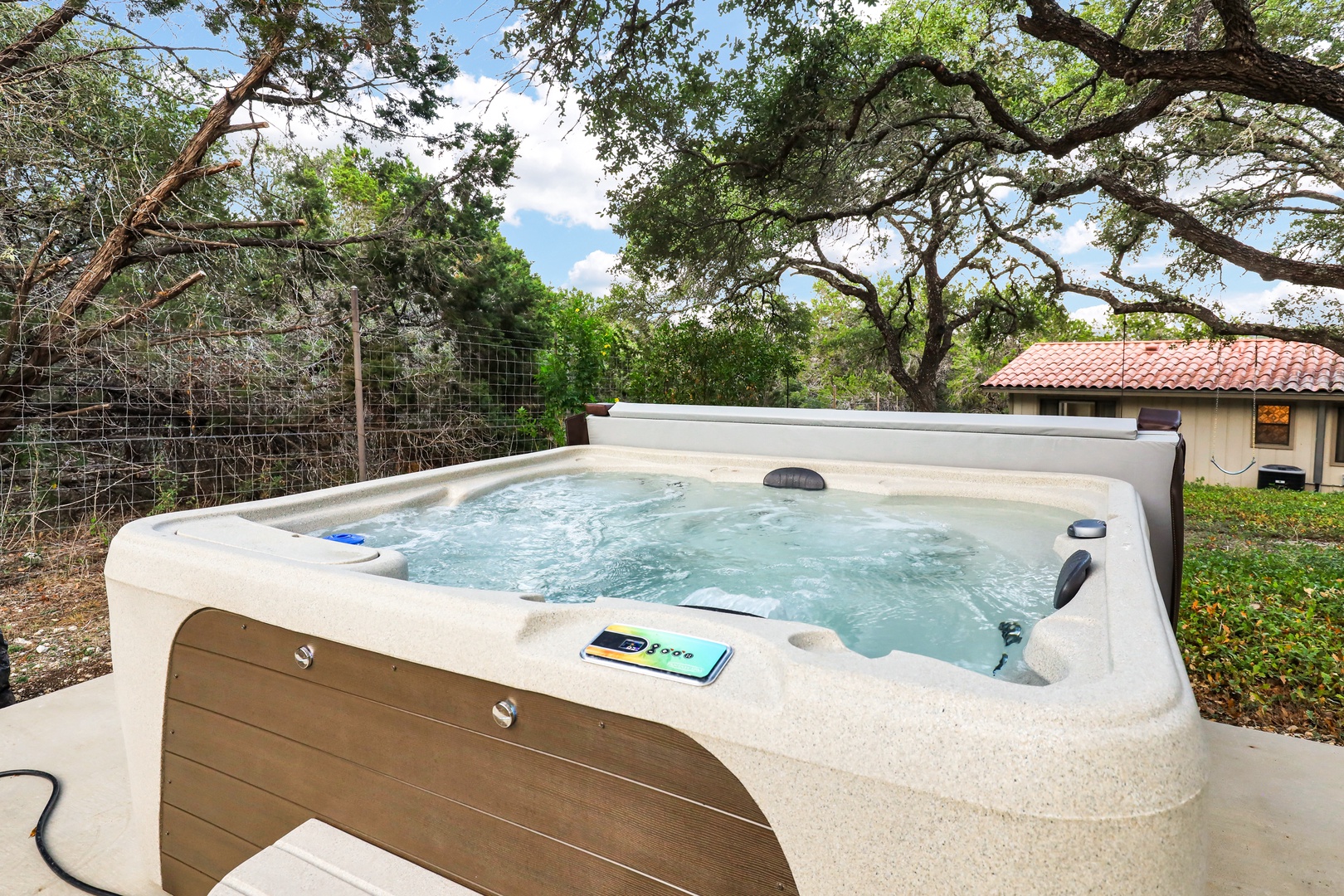 Soak your cares away in the bubbling private hot tub