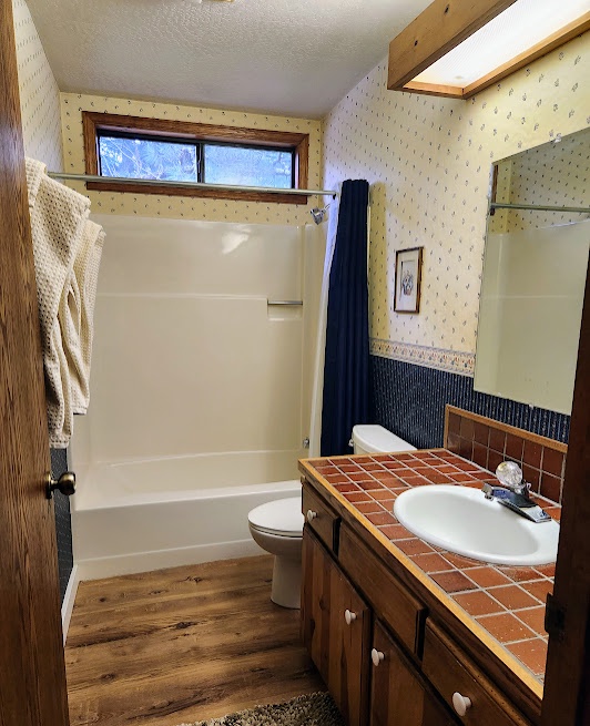 Bathroom 3 with shower/tub combo (Upstairs)