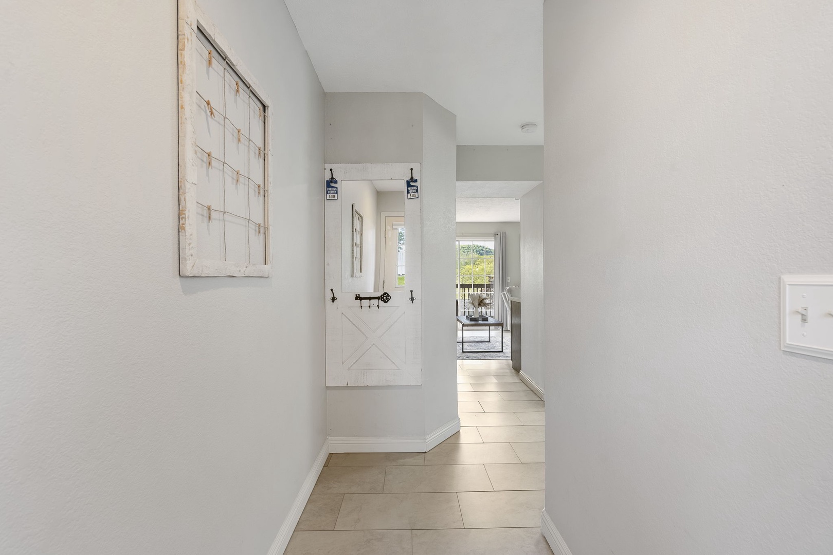 An airy, spacious entry hallway will welcome you home