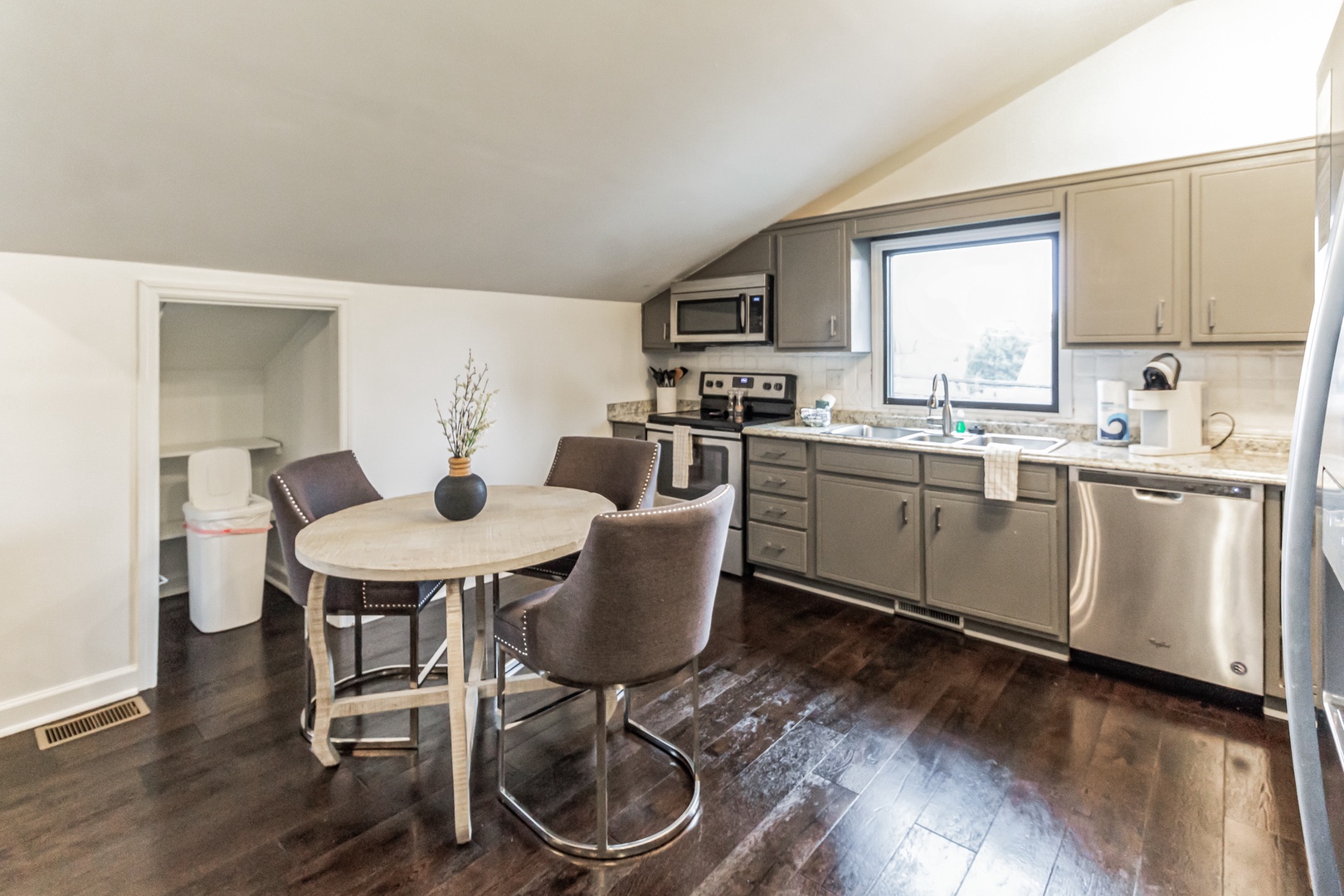 Unit C2: The open, airy kitchen offers ample space & all the comforts of home