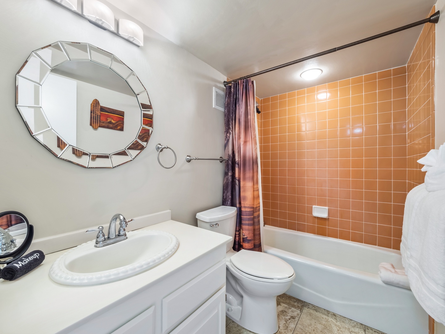 Shared bathroom with shower/tub combo