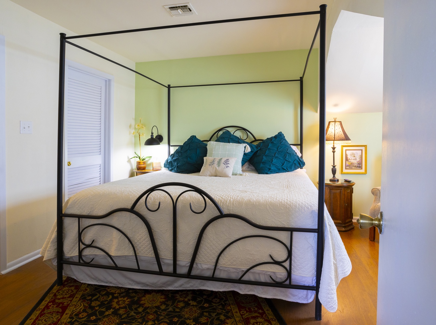 The primary bedroom boasts a regal king bed & smart TV