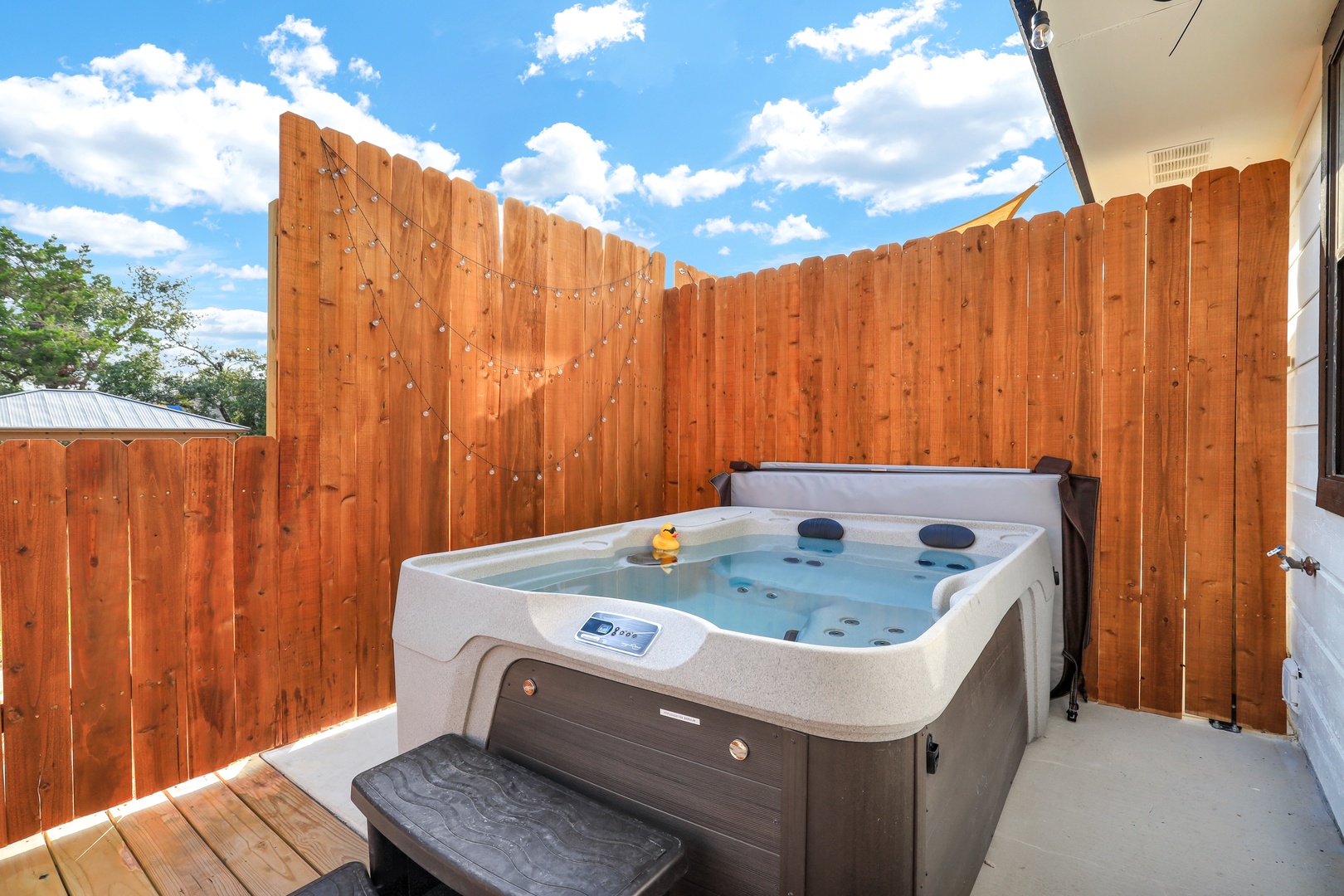 Head out to the patio to lounge & unwind in the bubbling hot tub