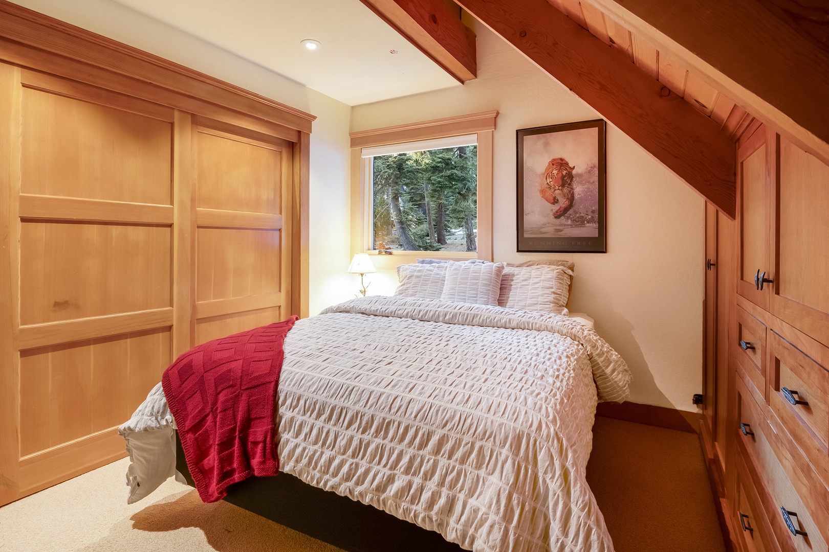 Relax and unwind in the cozy 3rd floor queen bedroom