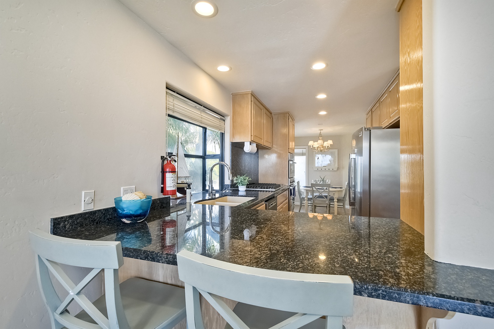 Sip morning coffee or grab a bite at the kitchen island, with seating for 3