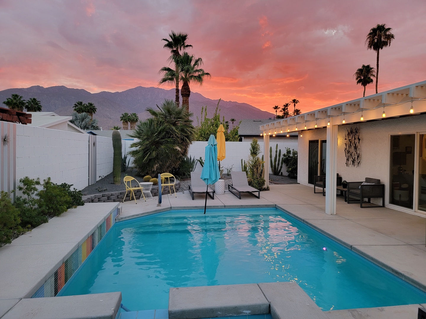 Enjoy your evenings by the pool with stunning mountain sunsets