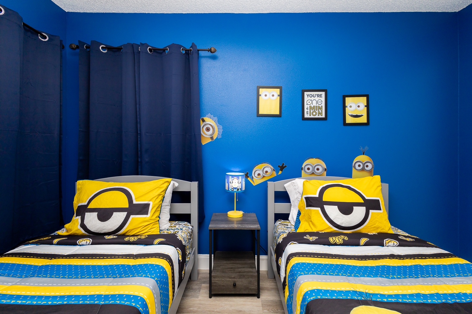 The Minions in your group will love this room’s plush twin beds & smart TV