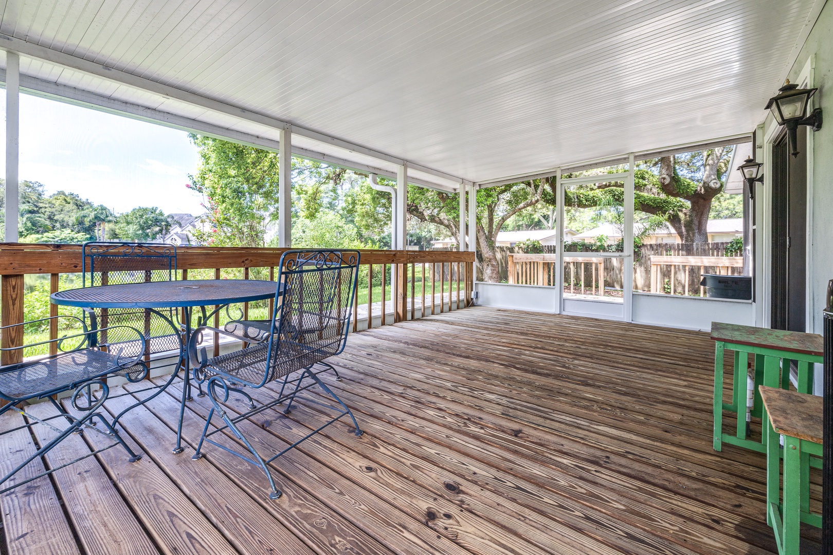 Lounge the day away in the fresh air on the screened porch!