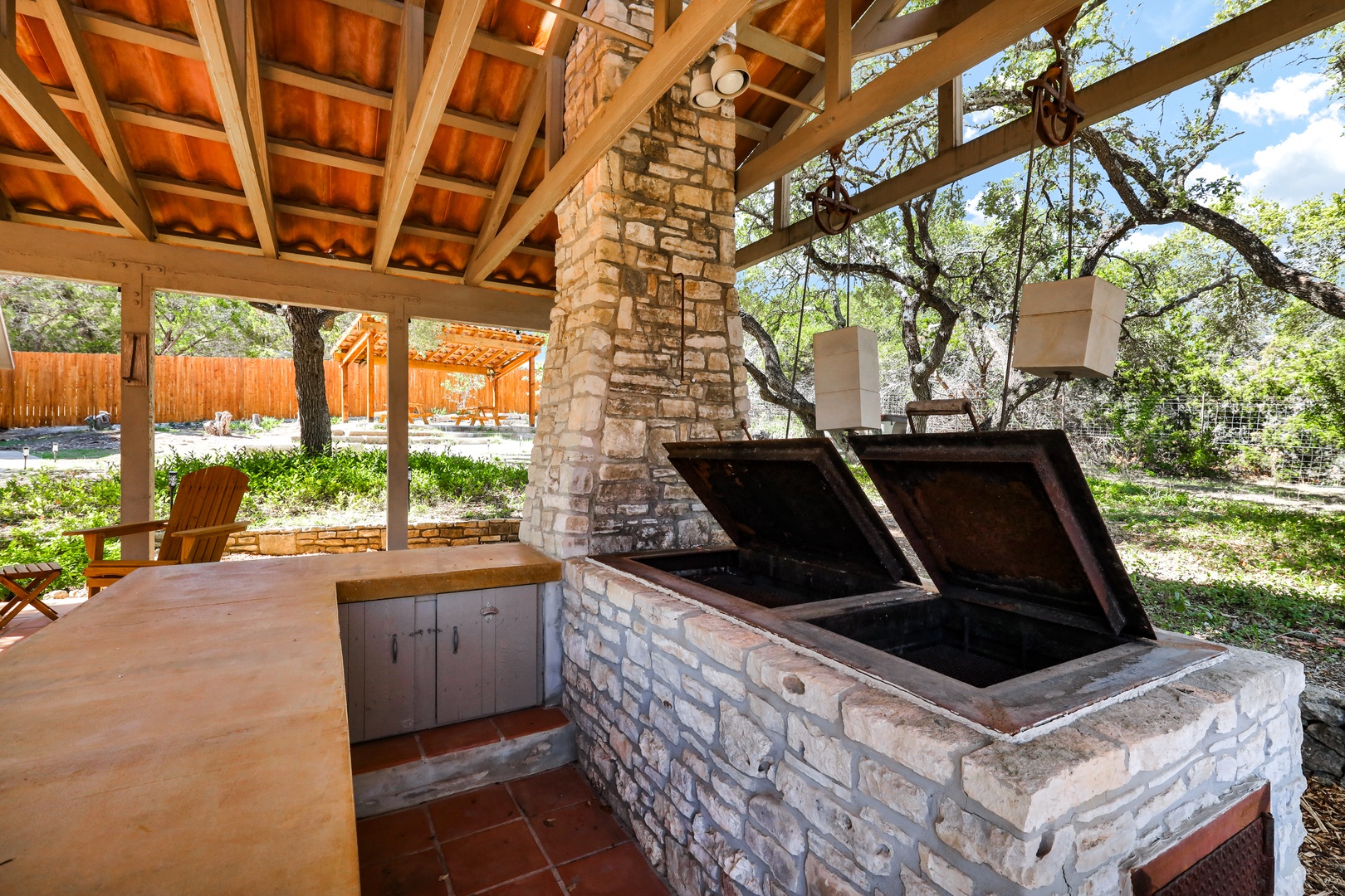 Grill-masters are sure to love the shaded outdoor kitchen