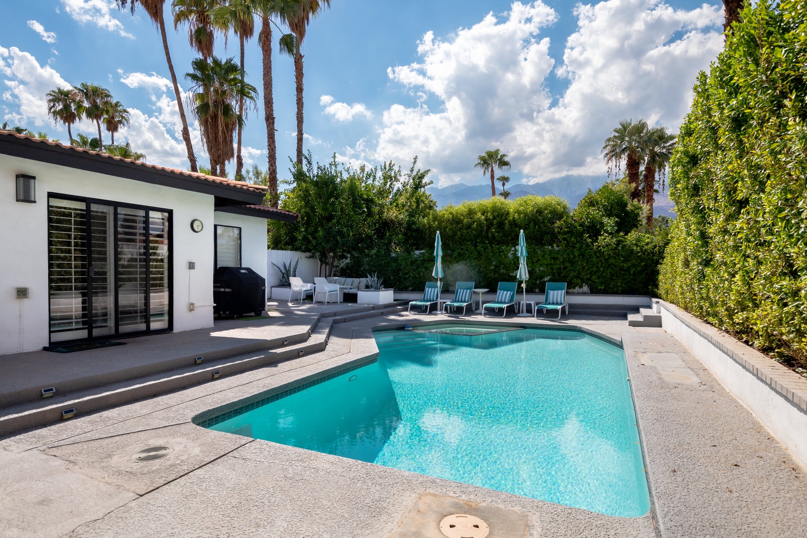 Soak in some Palm Spring rays poolside