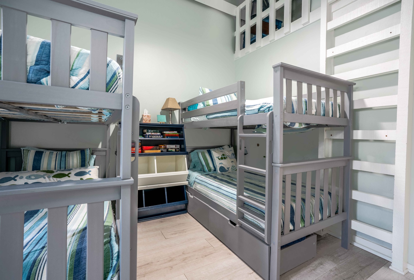 A pair of cozy twin-over-twin bunkbeds awaits in the final bedroom