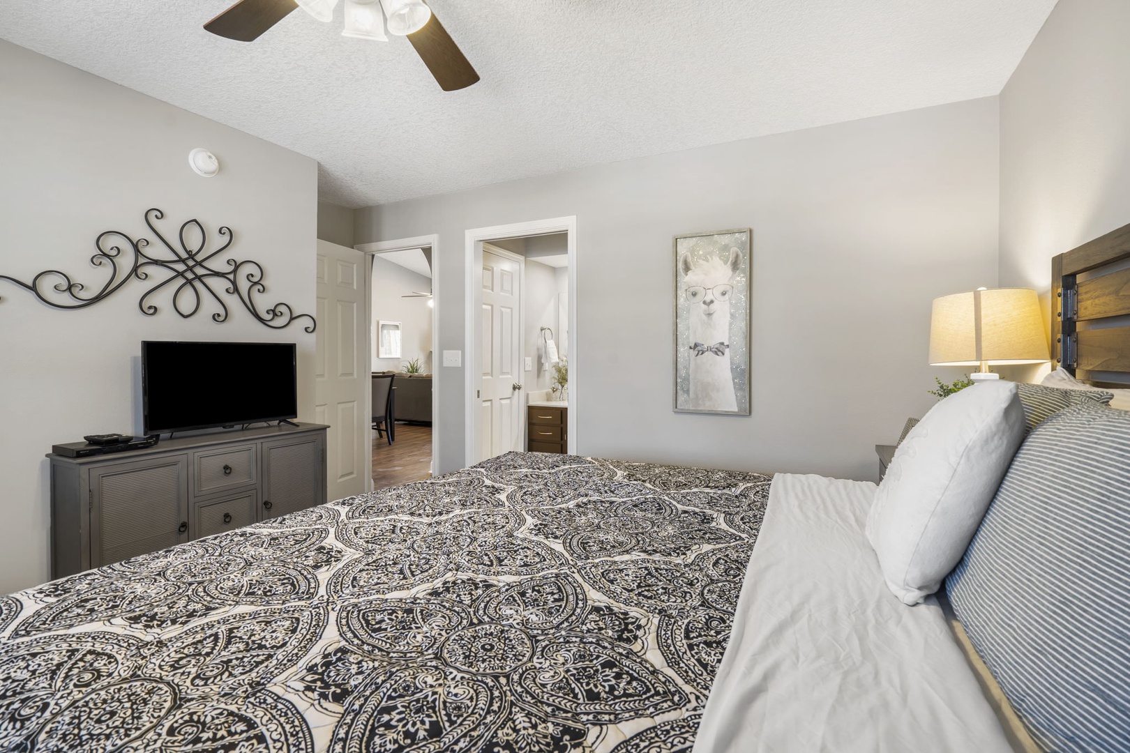 The 2nd king suite boasts a private ensuite, Smart TV, & ceiling fan